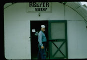 Saipan 1956 Collection, No. 113 Man In Front Of Reefer Shop 